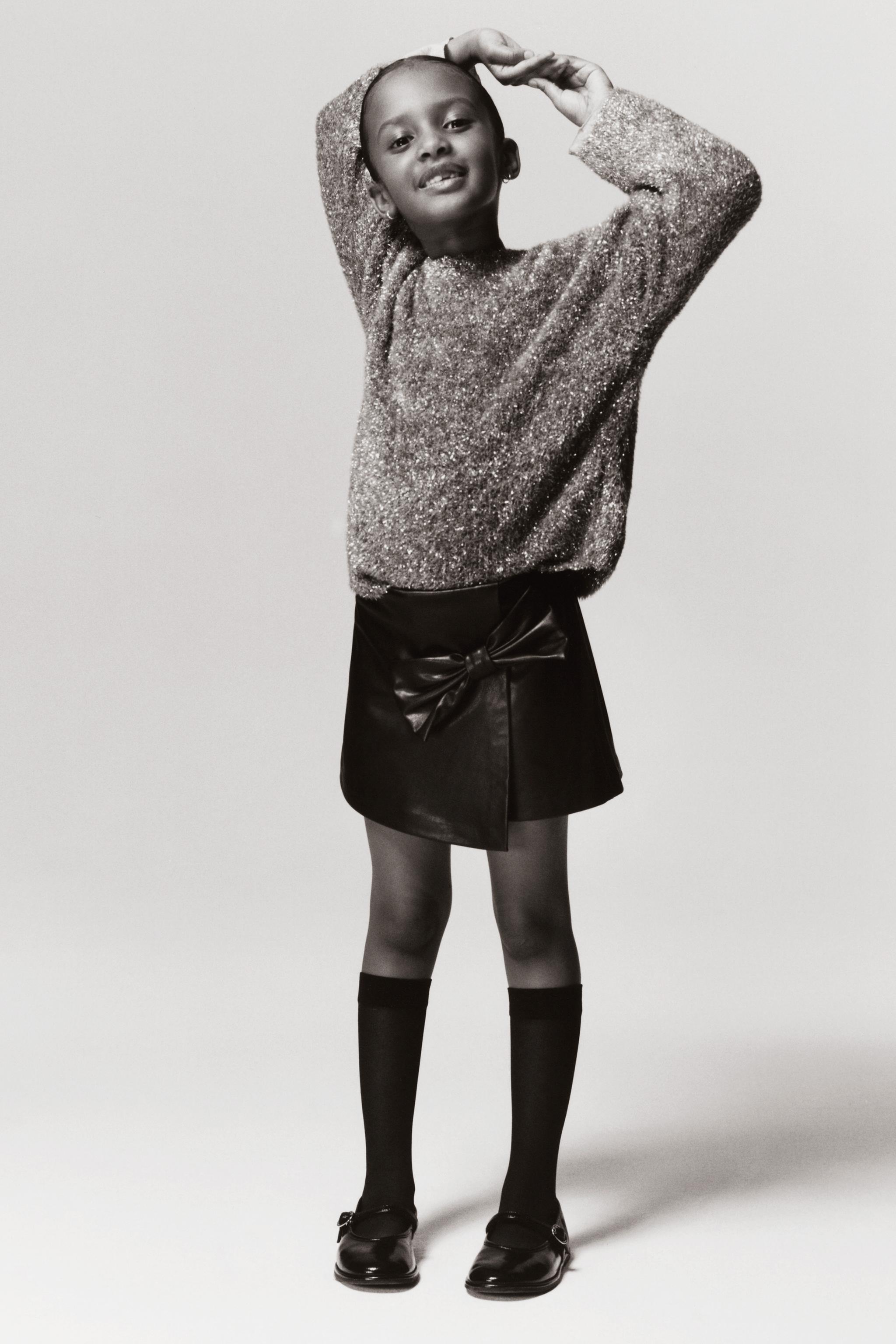 FAUX LEATHER BOW SKORT